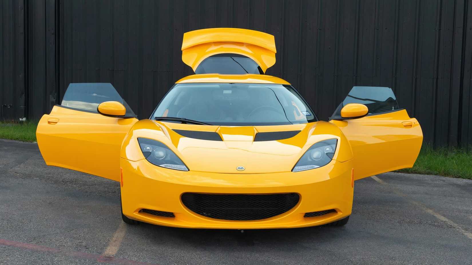 2010 Lotus Evora front exterior shot with doors open