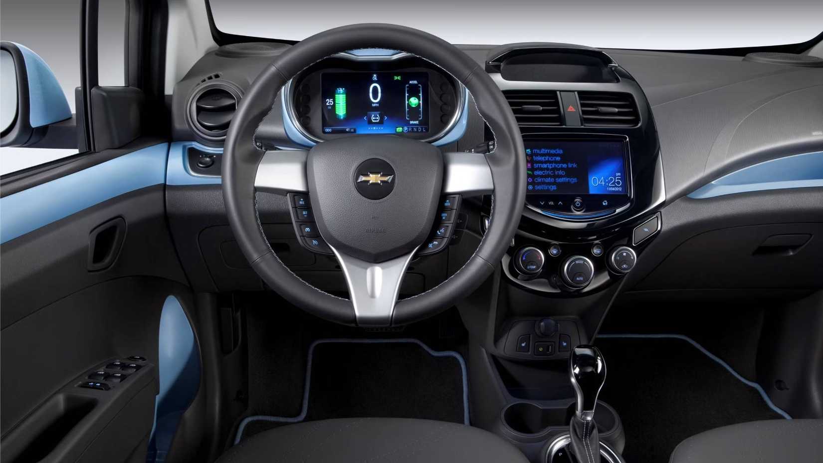An interior shot of the 2014 Chevrolet Spark EV's dashboard
