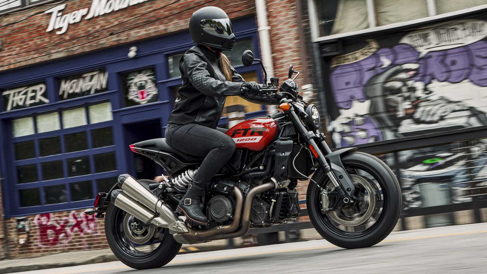 Indian FTR 1200 on city road profile view