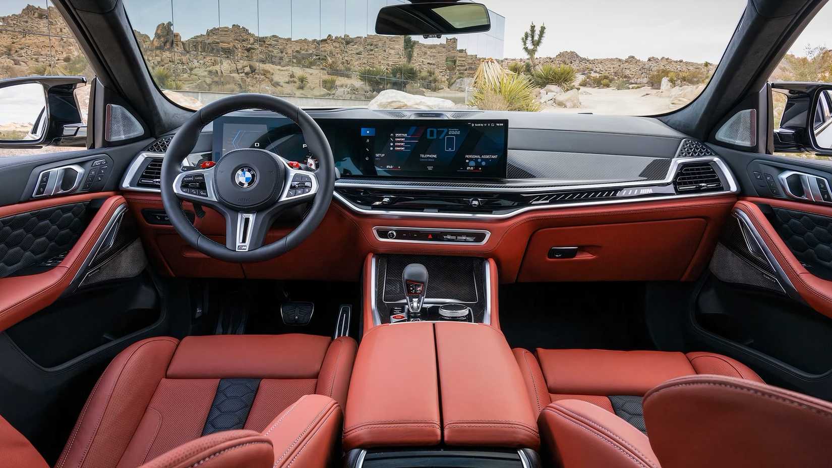 Interior shof of a 2025 BMW X6 M's front cabin showing dash