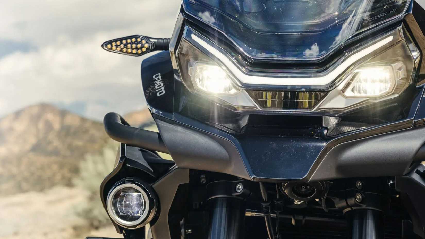 2025 CFMoto Ibex 800 E dual-pot LED headlamp design close-up shot