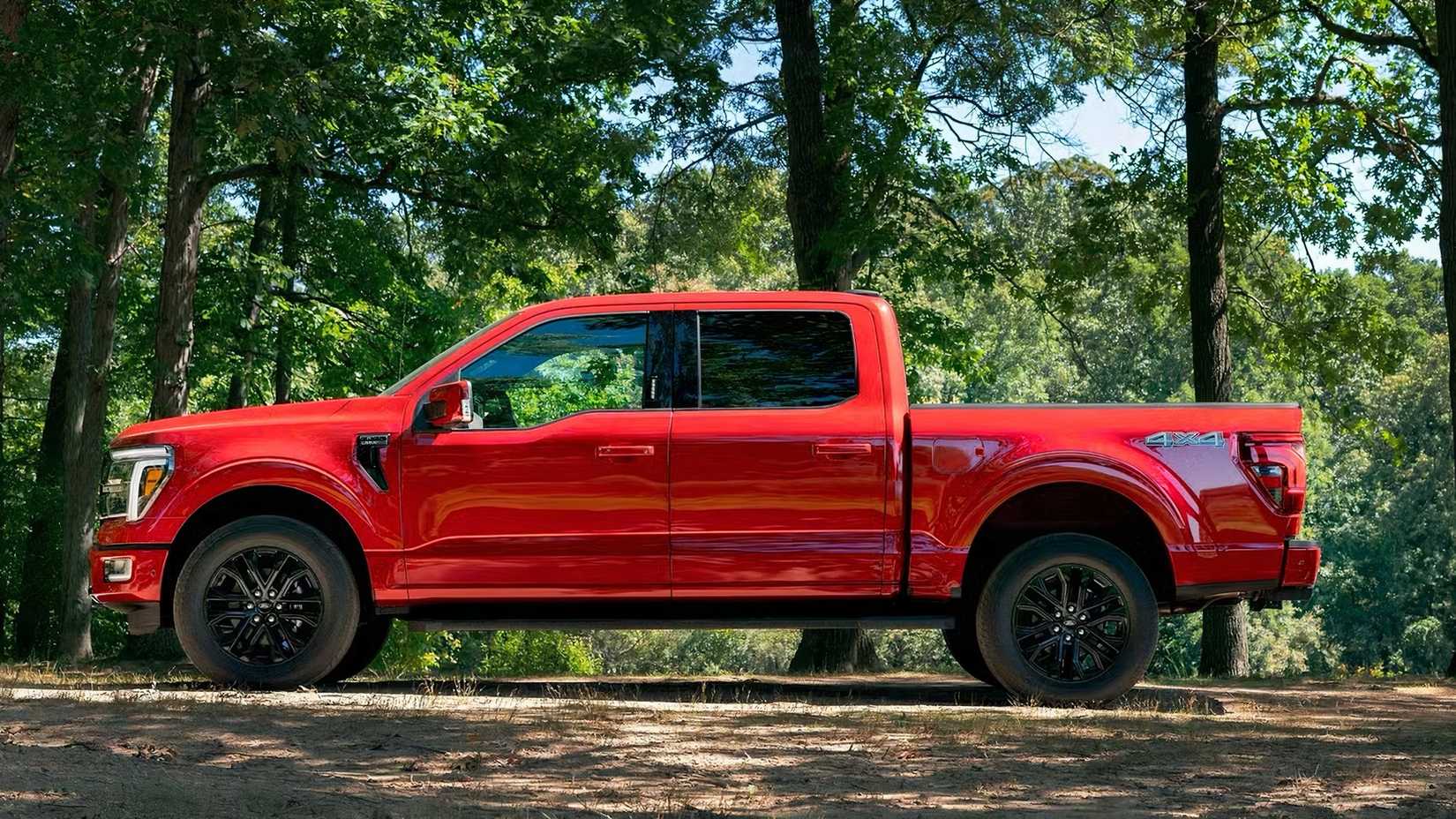 2025 Ford F-150 in red parked in woods
