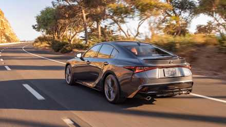 2025 Lexus IS 350 in gray driving on road