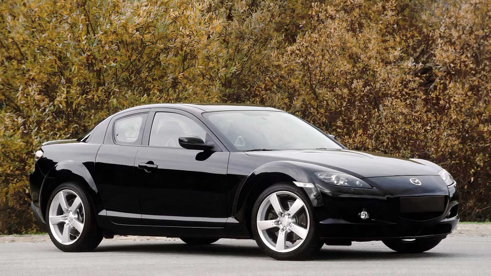 2008 Mazda RX-8 em preto estacionado