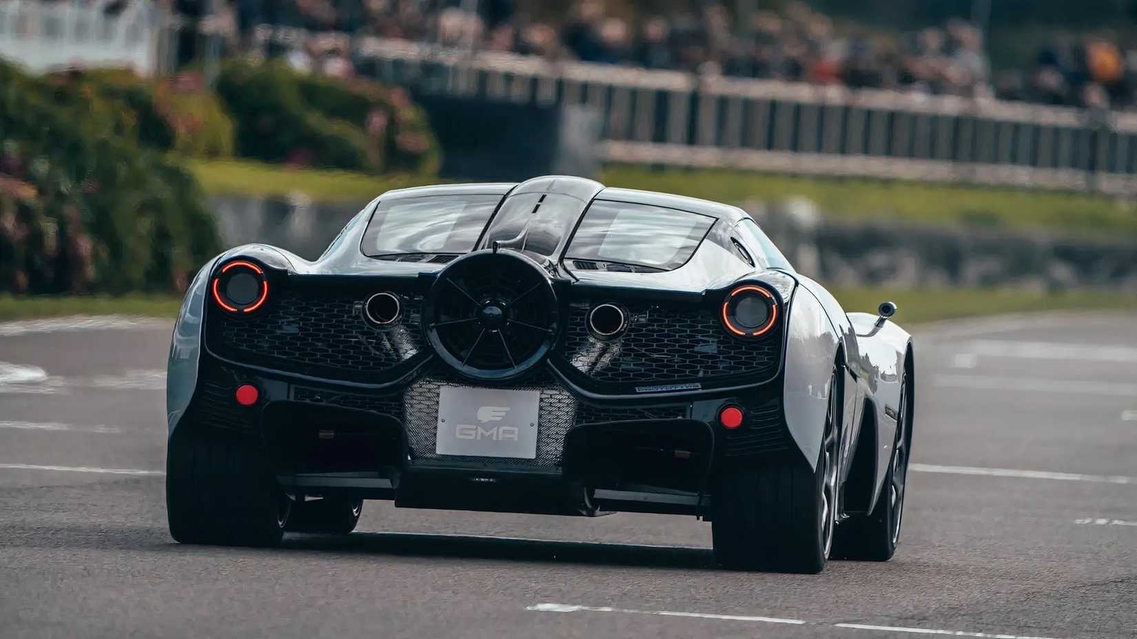 Gordon Murray Automotive T.50 in silver driving at Goodwood