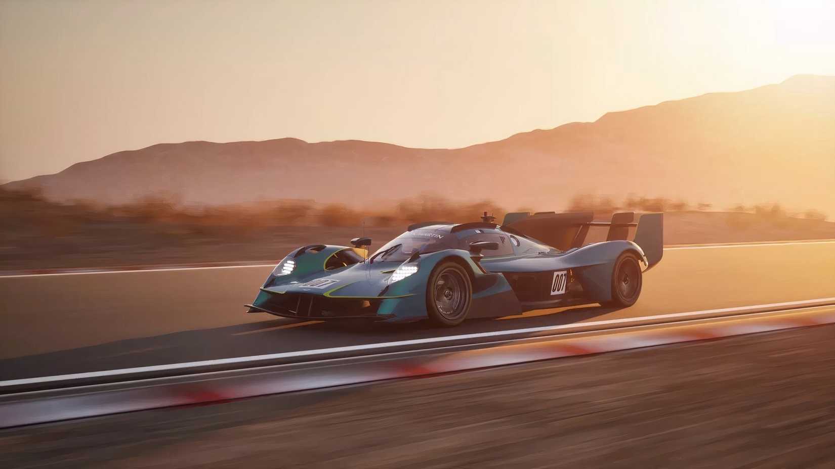 Aston Martin Valkyrie in blue driving on racetrack