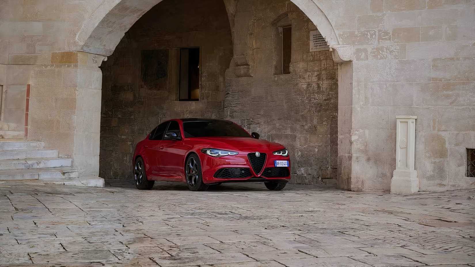 2025 Alfa Romeo Giulia in red parked under arch