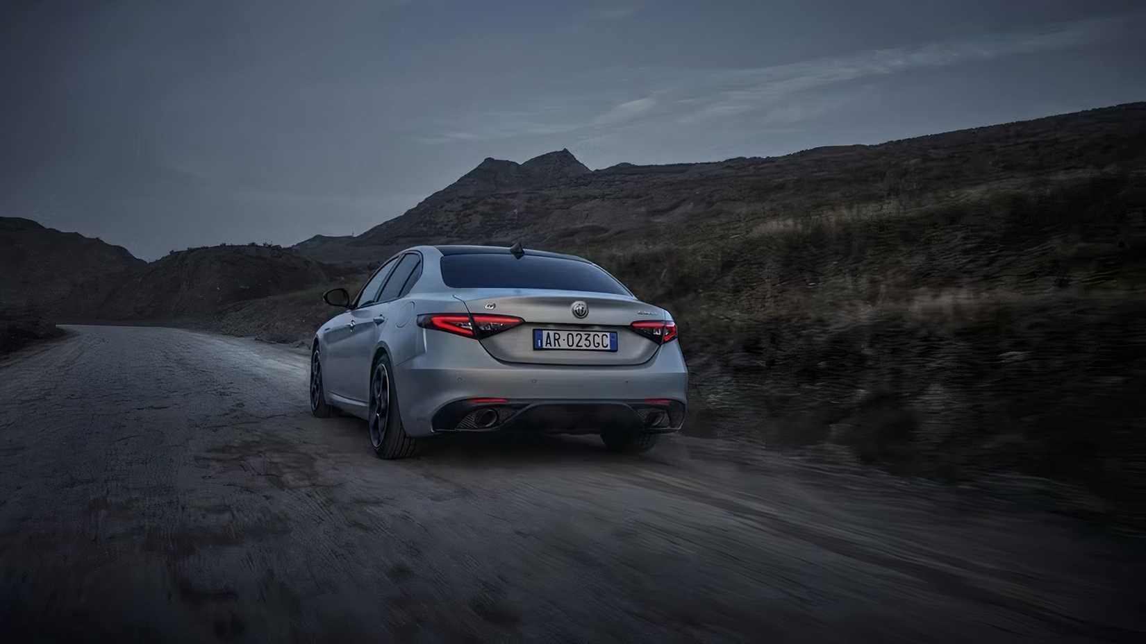 2025 Alfa Romeo Giulia in silver driving on road