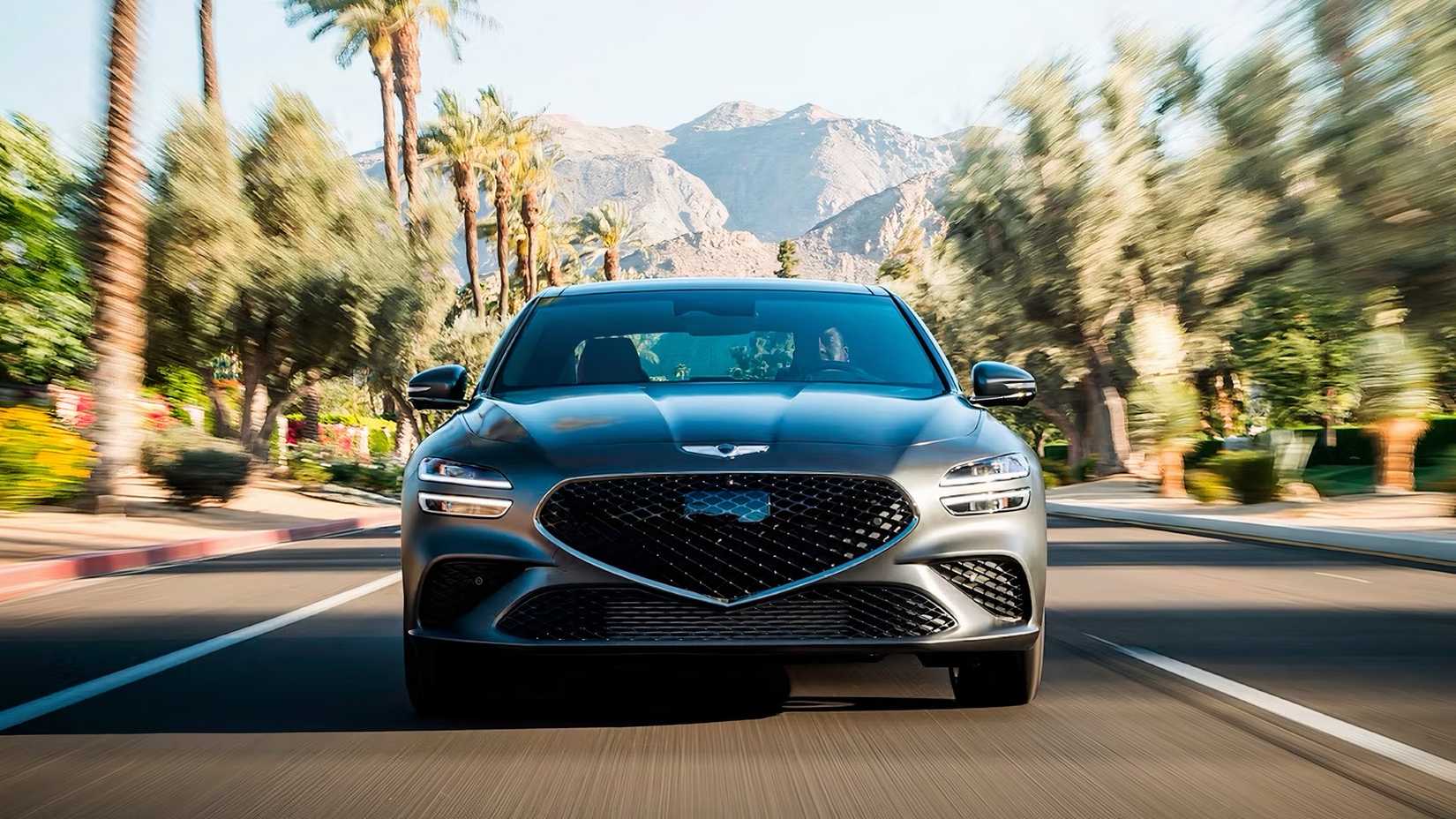 2025 Genesis G70 in gray driving on road