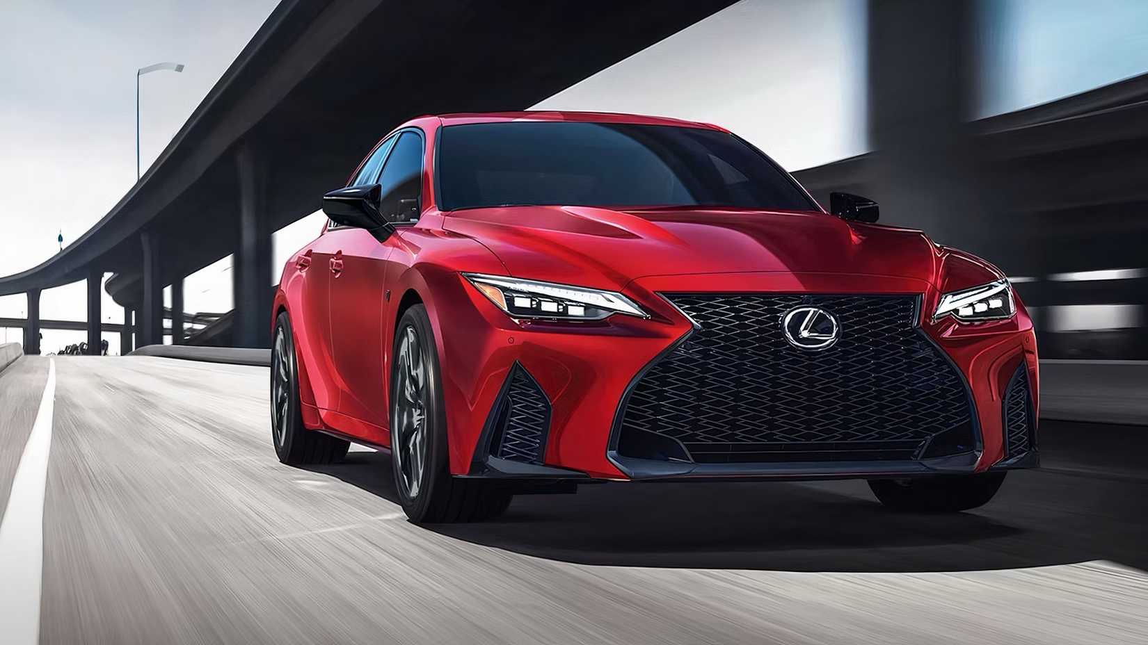 2025 Lexus IS 500 in red driving on road