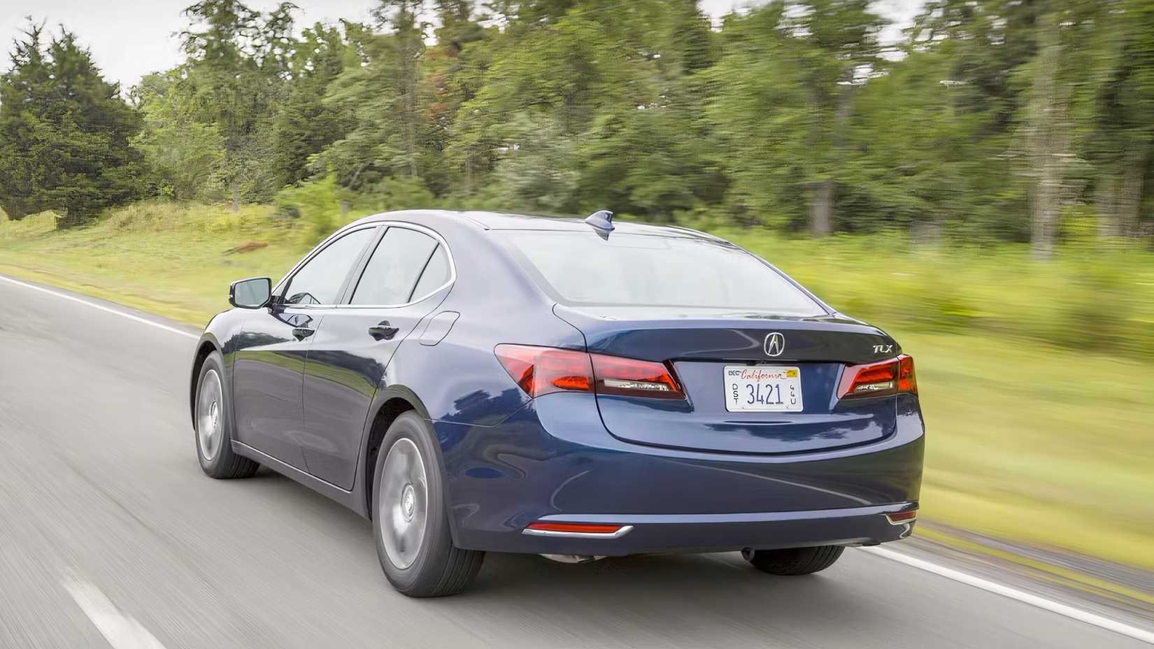2016 Acura TLX in blue driving on road