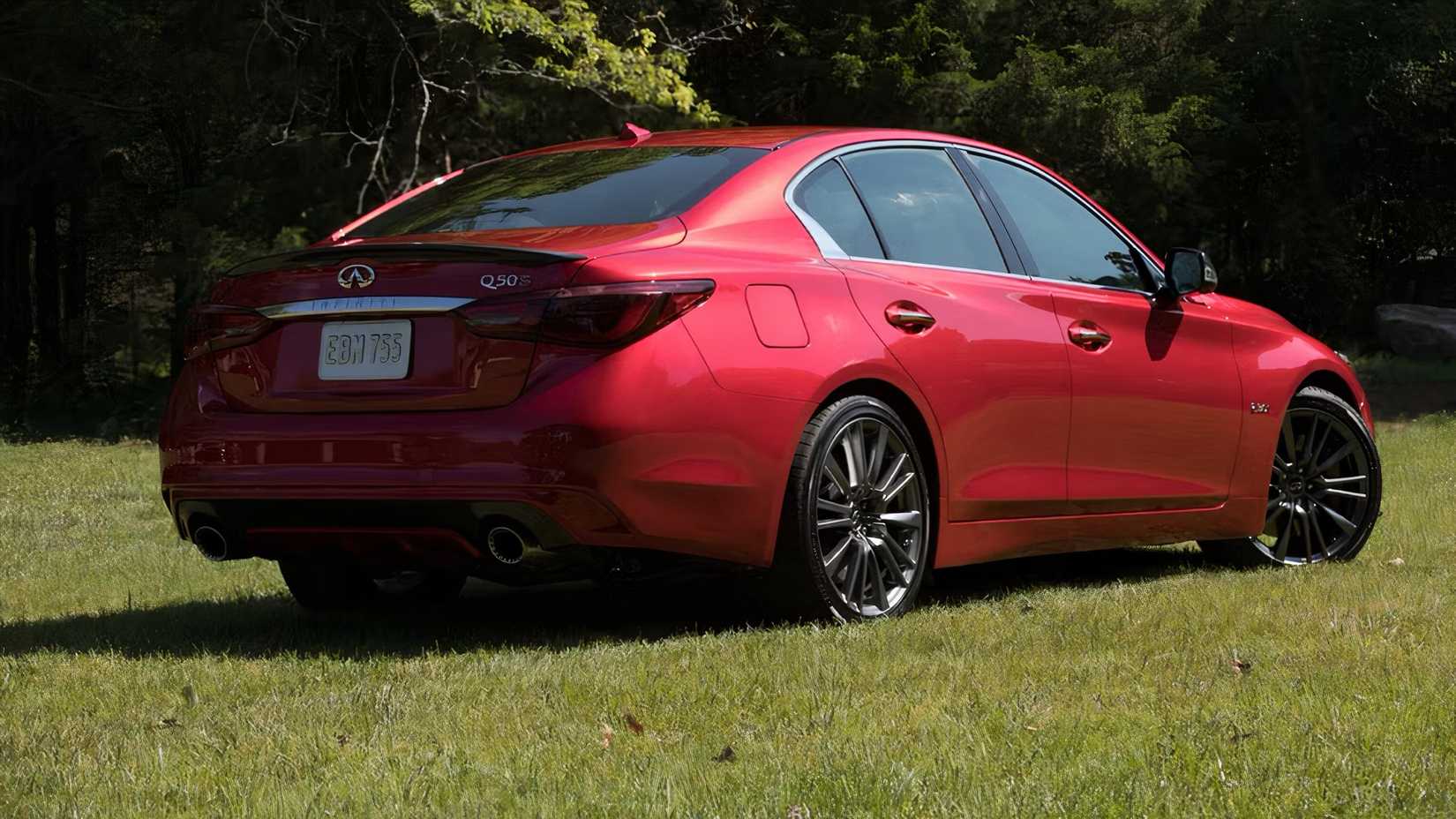 2019 Infiniti Q50 in red parked on grass