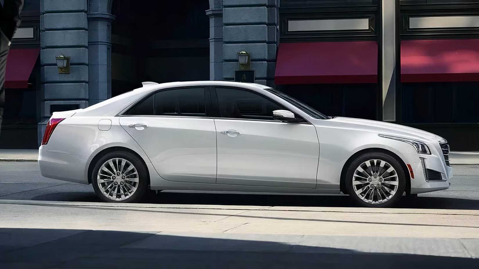 2017 Cadillac CTS in silver parked on city street