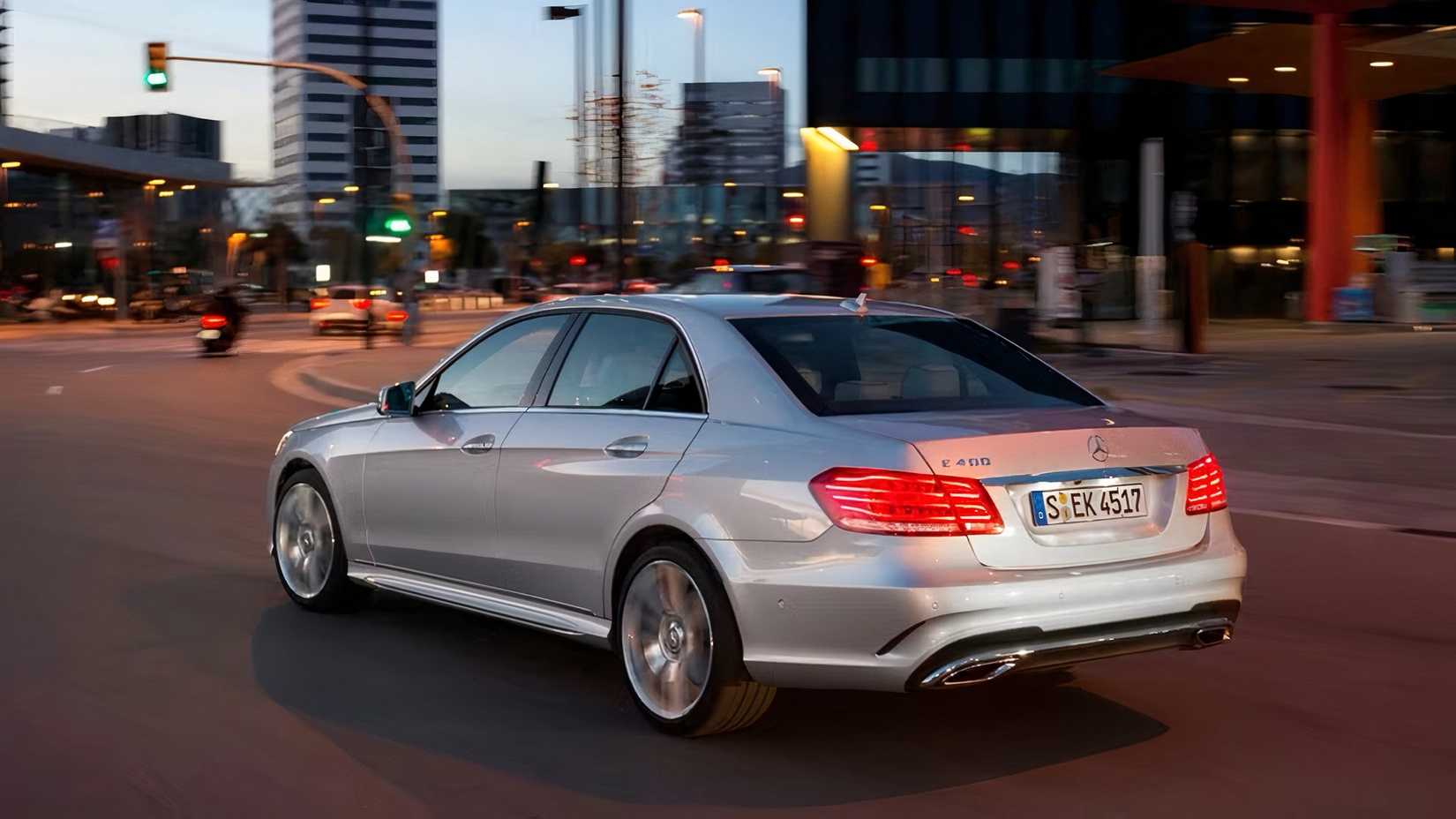 2016 Mercedes-Benz E-Class in silver driving in city