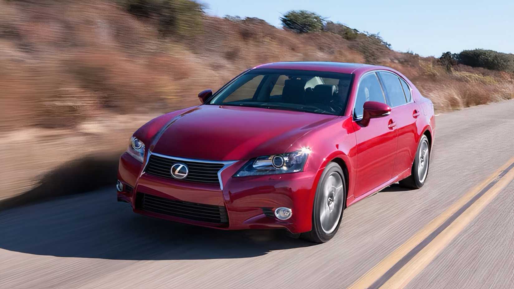 2015 Lexus GS in red driving on road