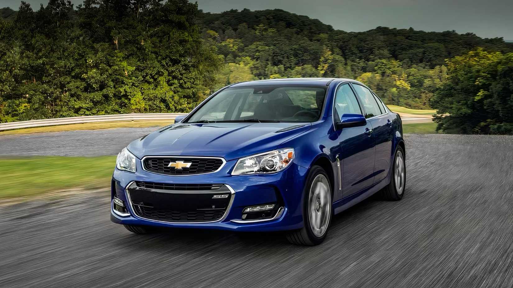 2017 Chevrolet SS in blue driving. on country road