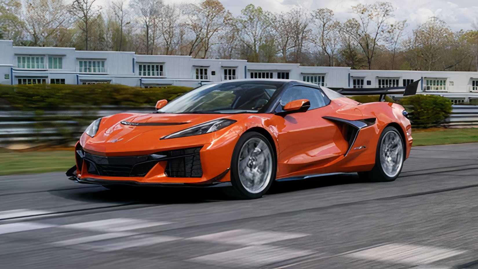 2026 Chevrolet Corvette ZR1X in orange being driven on track