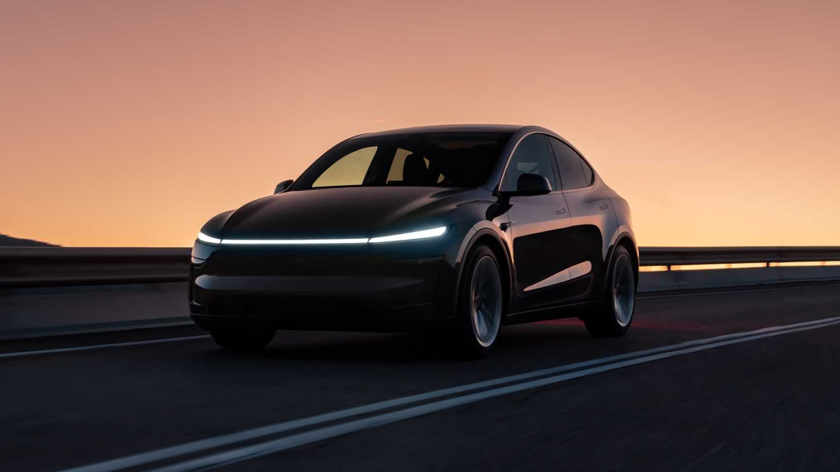Shadowy motion front three-quarters shot of a Tesla Model Y 