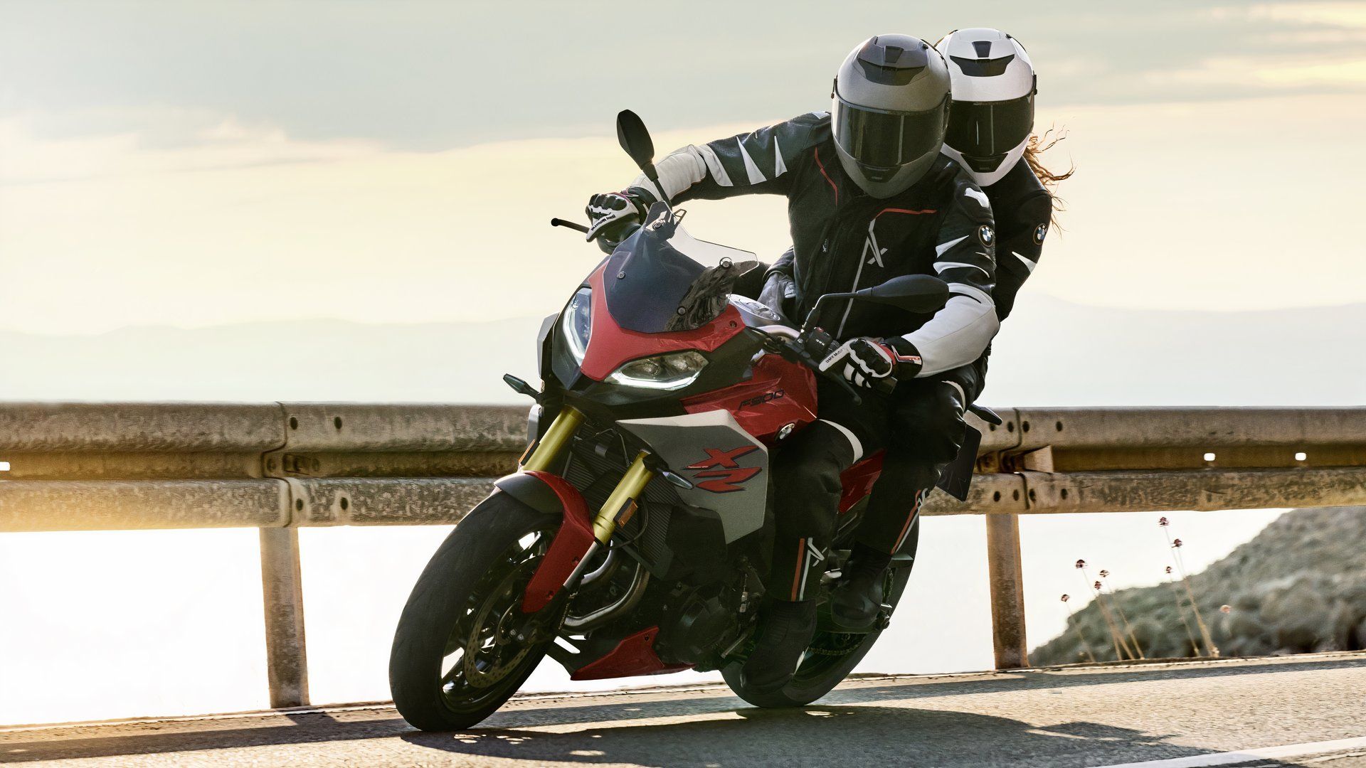 2025 BMW F 900 XR cornering with pillion 