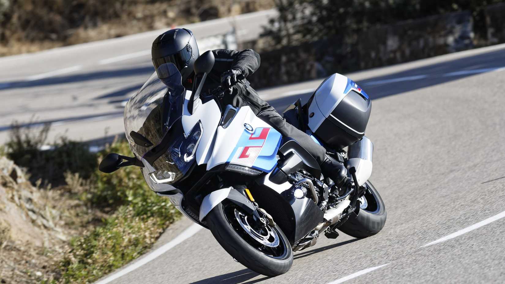 2025 BMW K 1600 GT cornering on a winding road