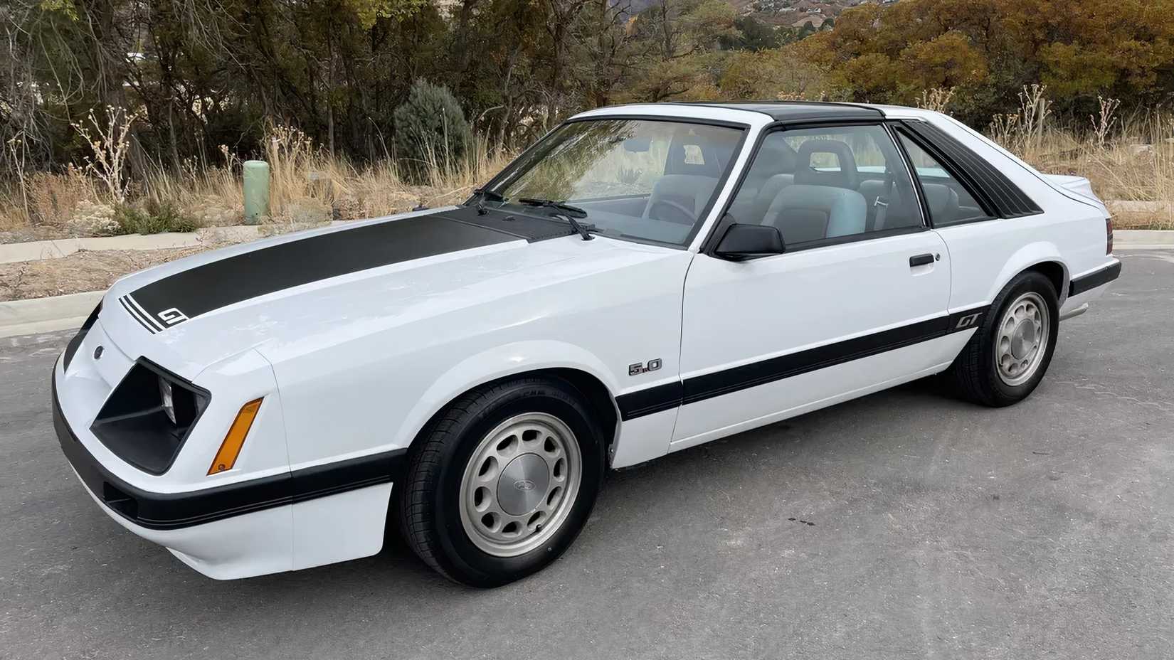 1985 Ford Mustang GT coupe, front 3/4