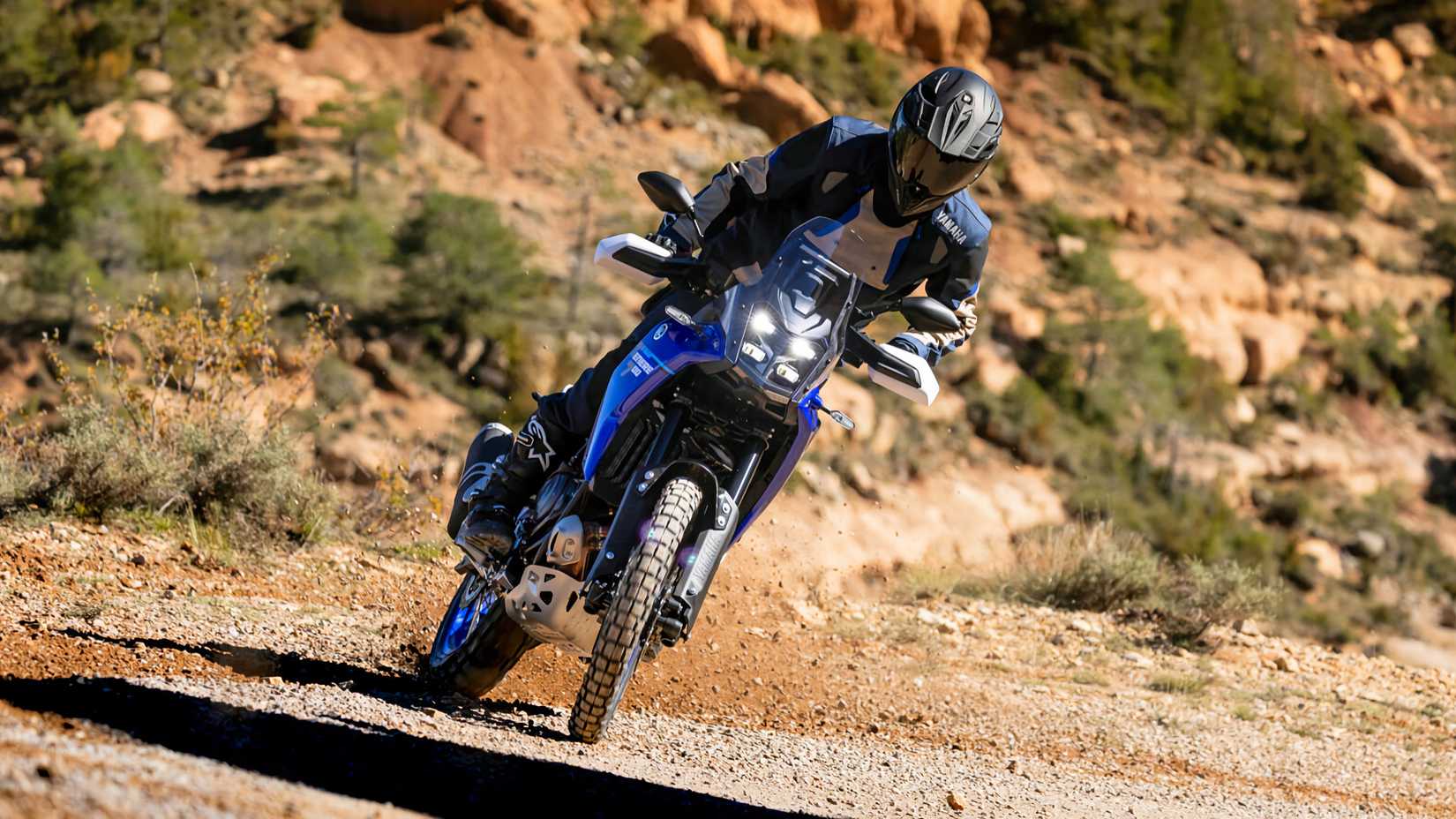 Rider sliding 2025 Yamaha Ténéré 700 in the dirt