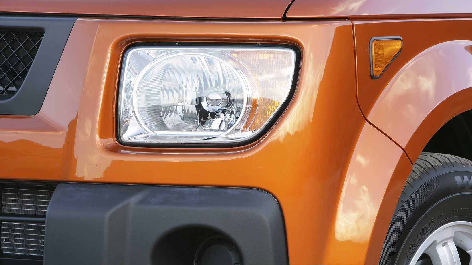 Orange 2006 Honda Element headlight