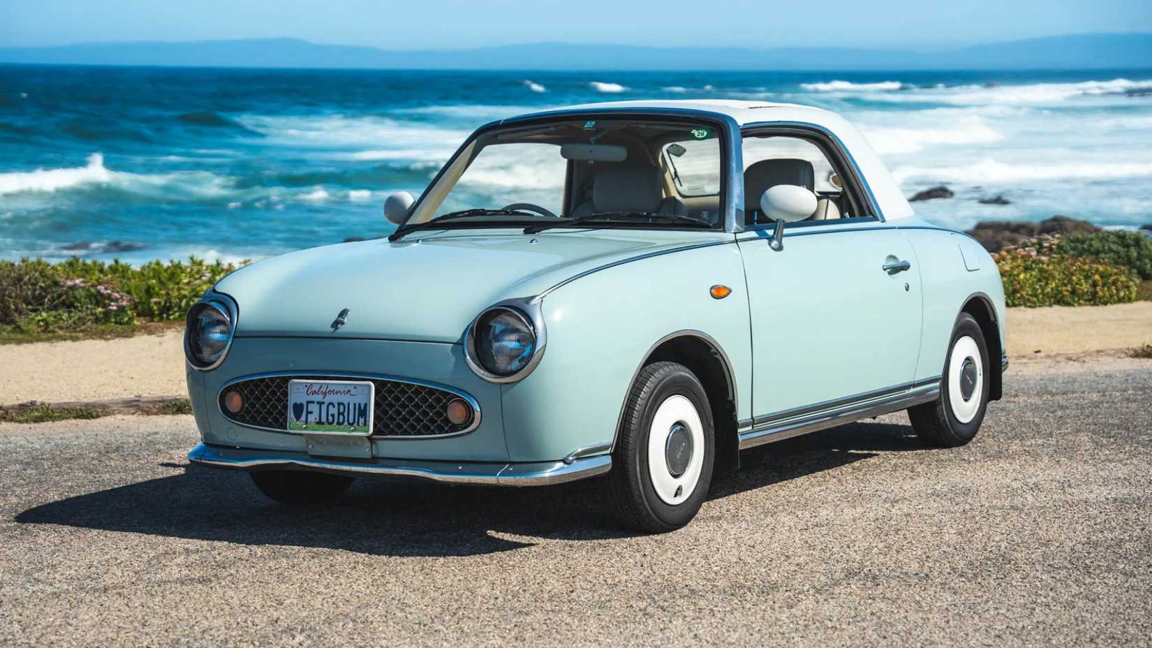 Blue 1991 Nissan Figaro