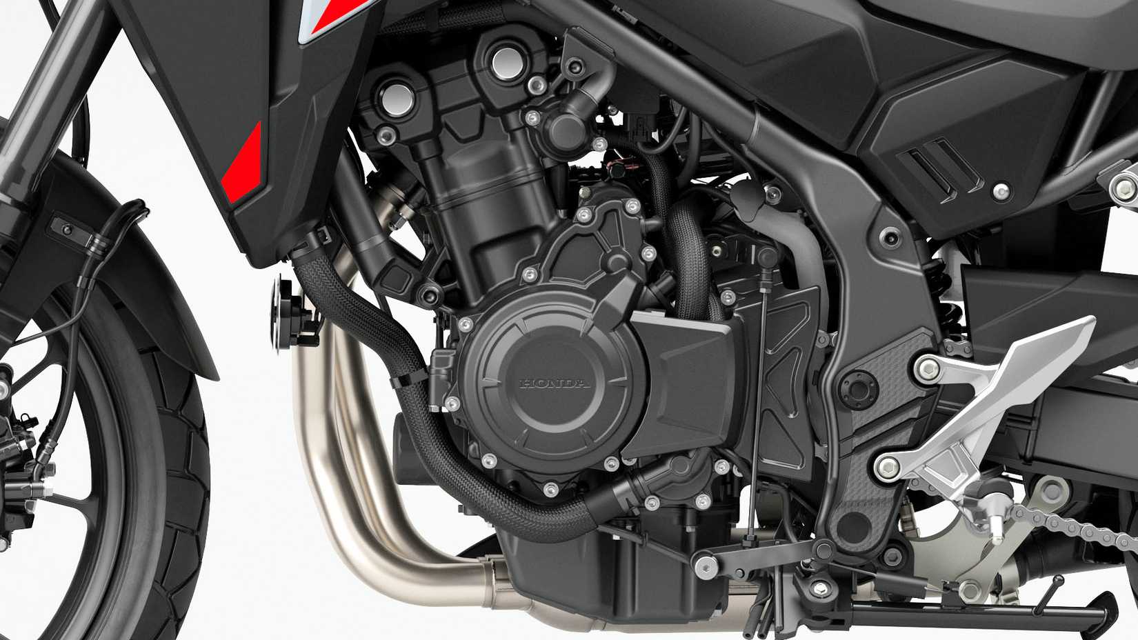 Detalhe em close do motor Honda NX500 2025 - esquerda