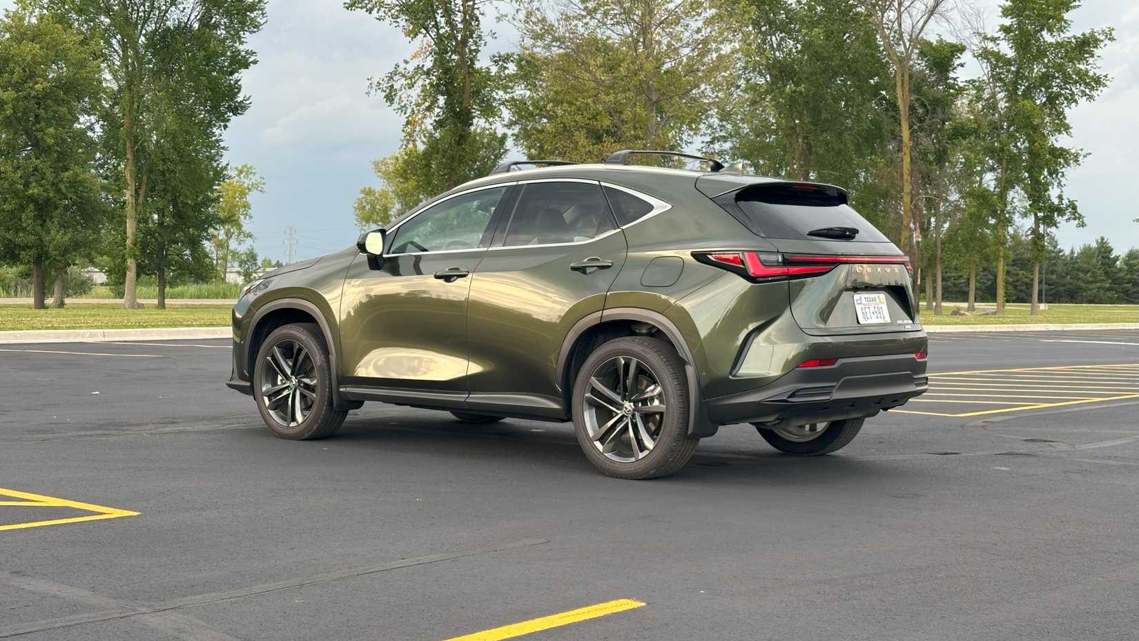 2025 Lexus NX 450h+ Luxury -- Rear Three-Quarter 02