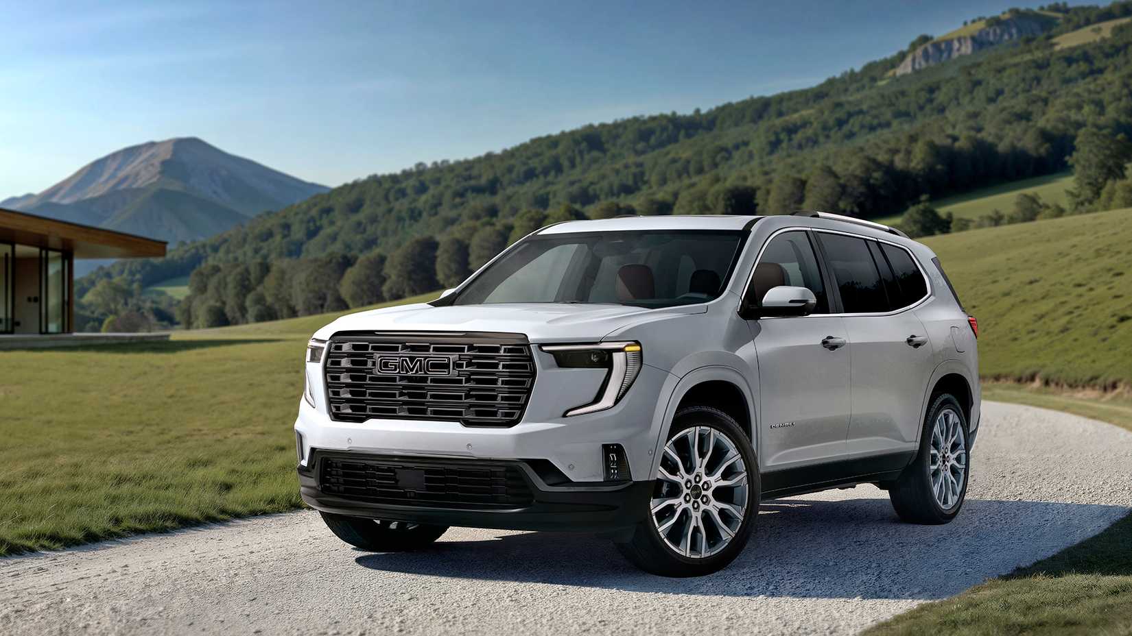 Front 3/4 shot of 2026 GMC Acadia Denali Ultimate parked