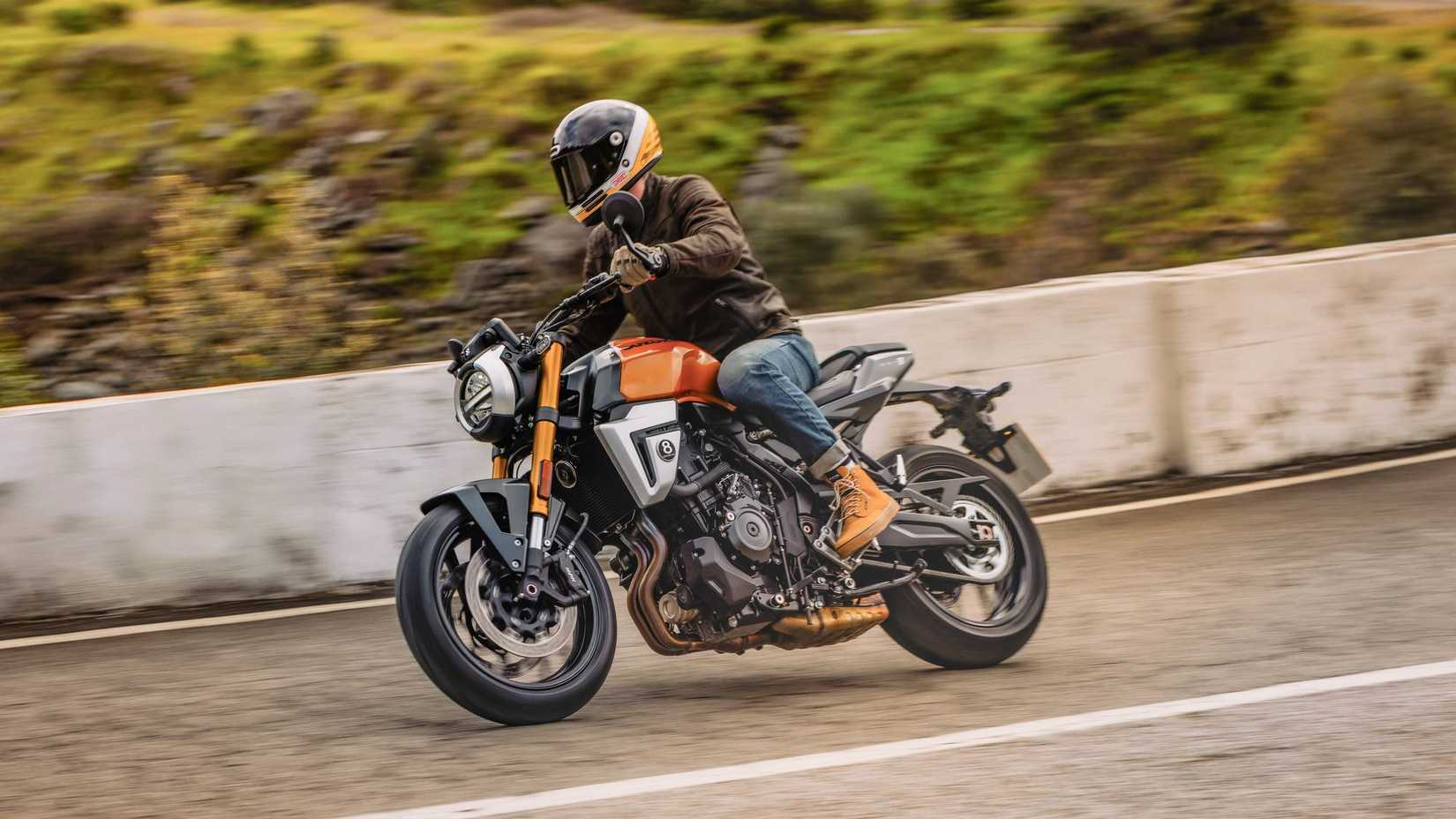 2026 Suzuki GSX-8T shown turning on the road in action shot