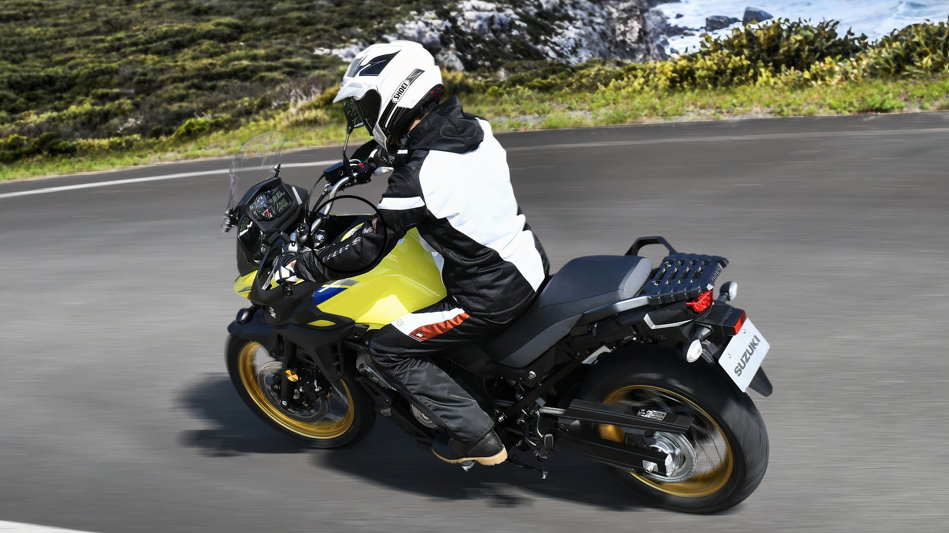 Suzuki V-Strom 650 cornering rear third quarter view