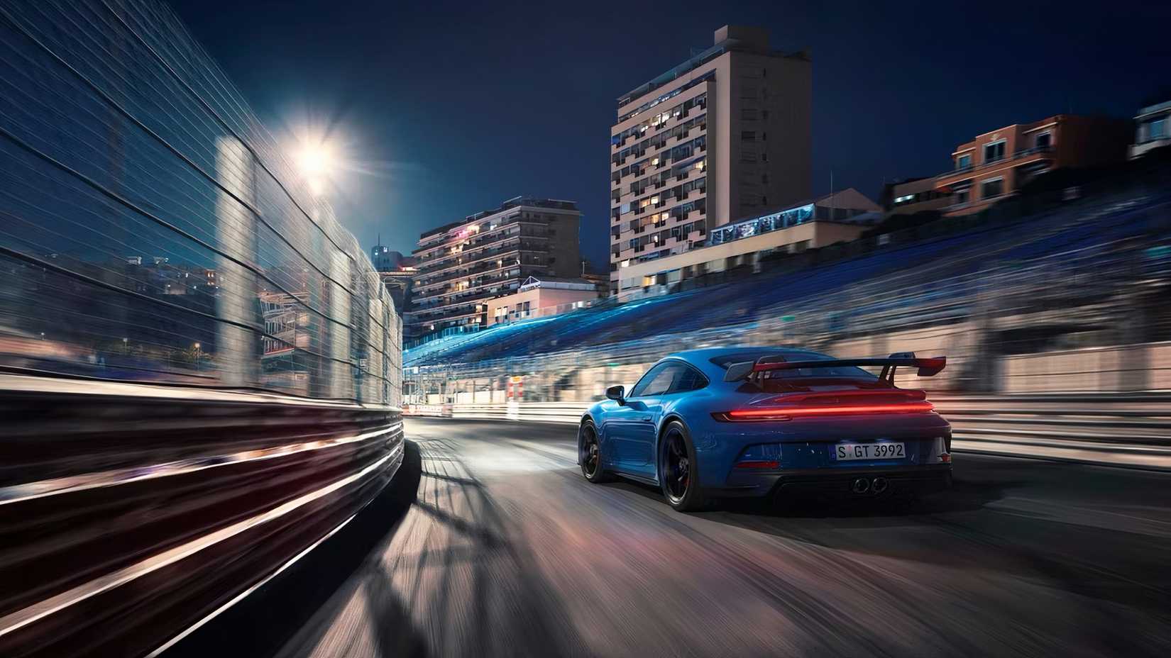 2022 Porsche 911 GT3 in blue driving on track