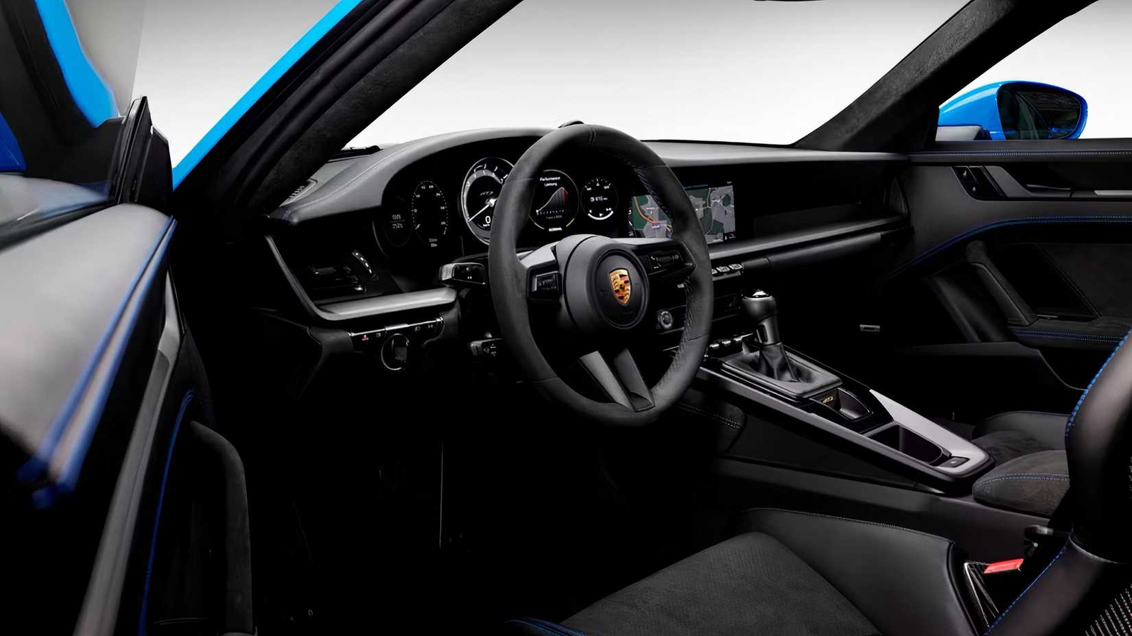 Interior do Porsche 911 GT3 2022 mostrando cabine dianteira