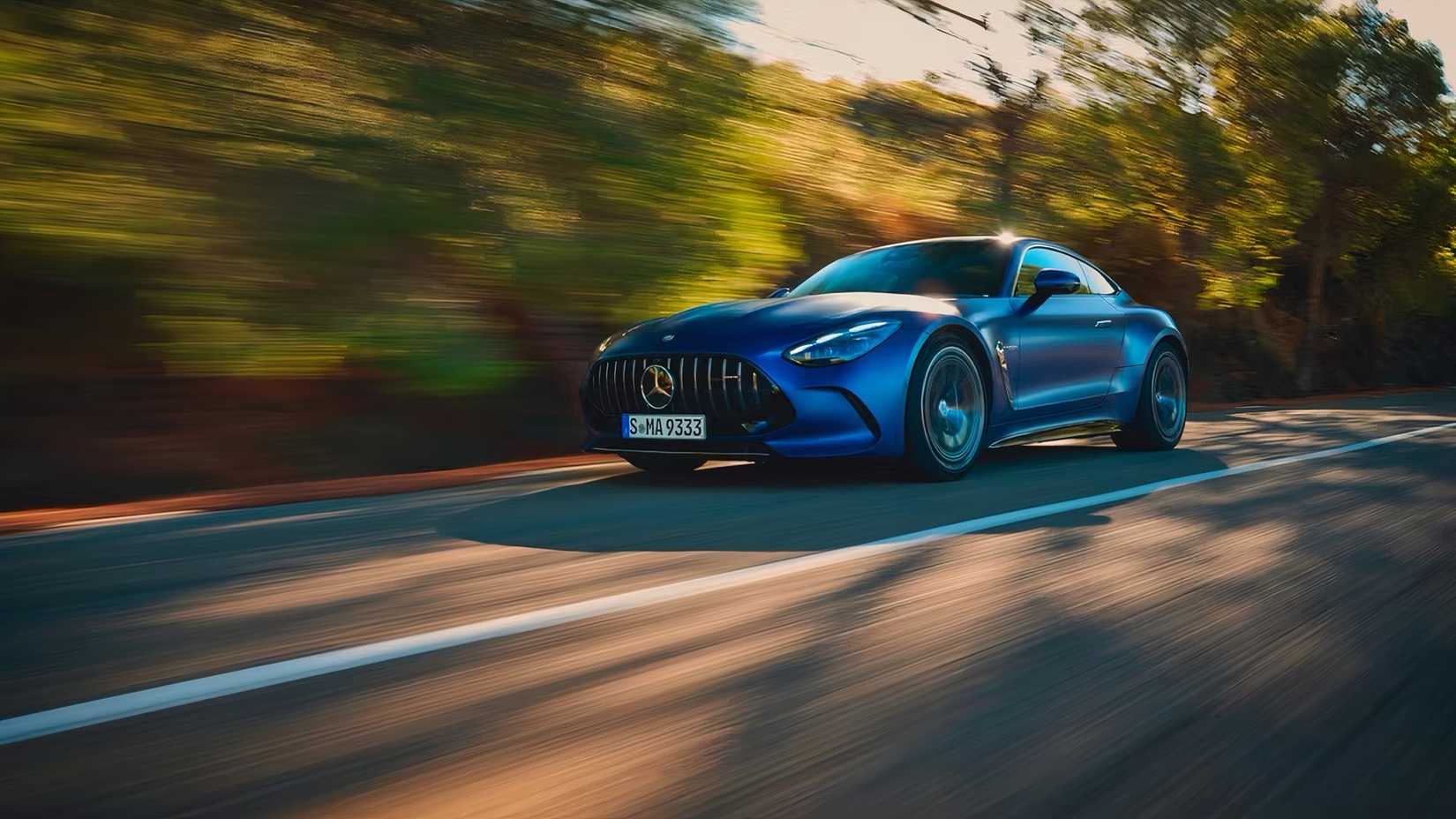 2025 Mercedes-AMG GT 55 Coupe in blue driving on road
