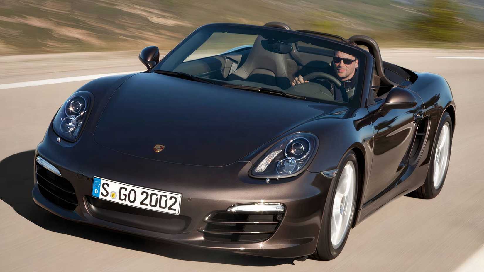 2016 Porsche Boxster in gray driving on the road