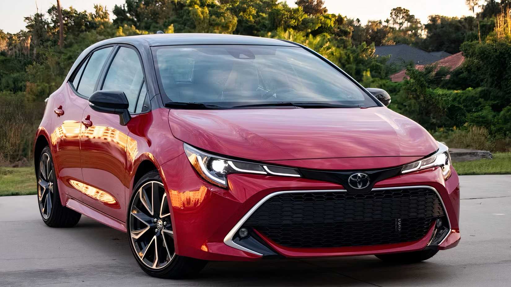 2025 Toyota Corolla Hatchback in red parked