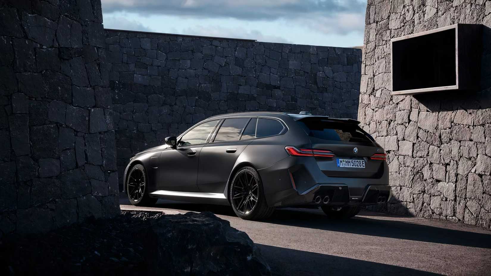 2025 BMW M5 Touring in matte black parked