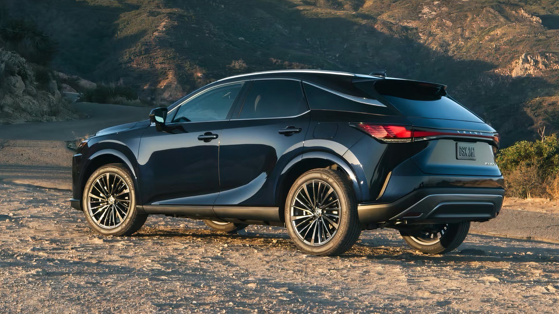 2025 Lexus RX in black parked off-road