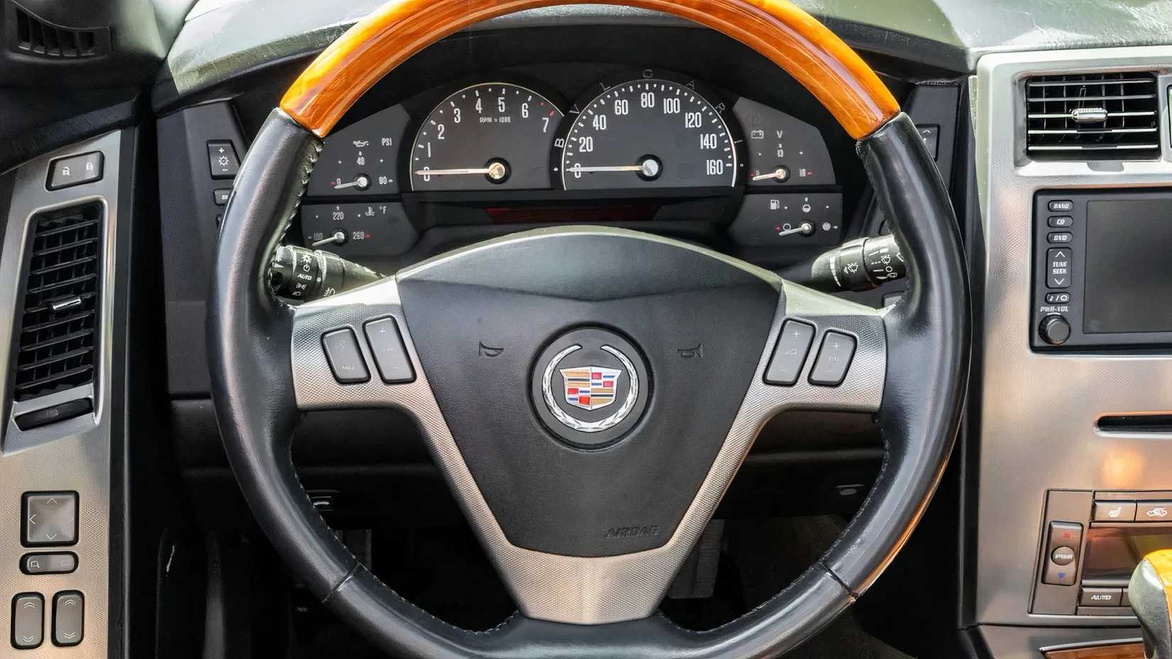 2004 Cadillac XLR interior showing steering wheel and dashboard