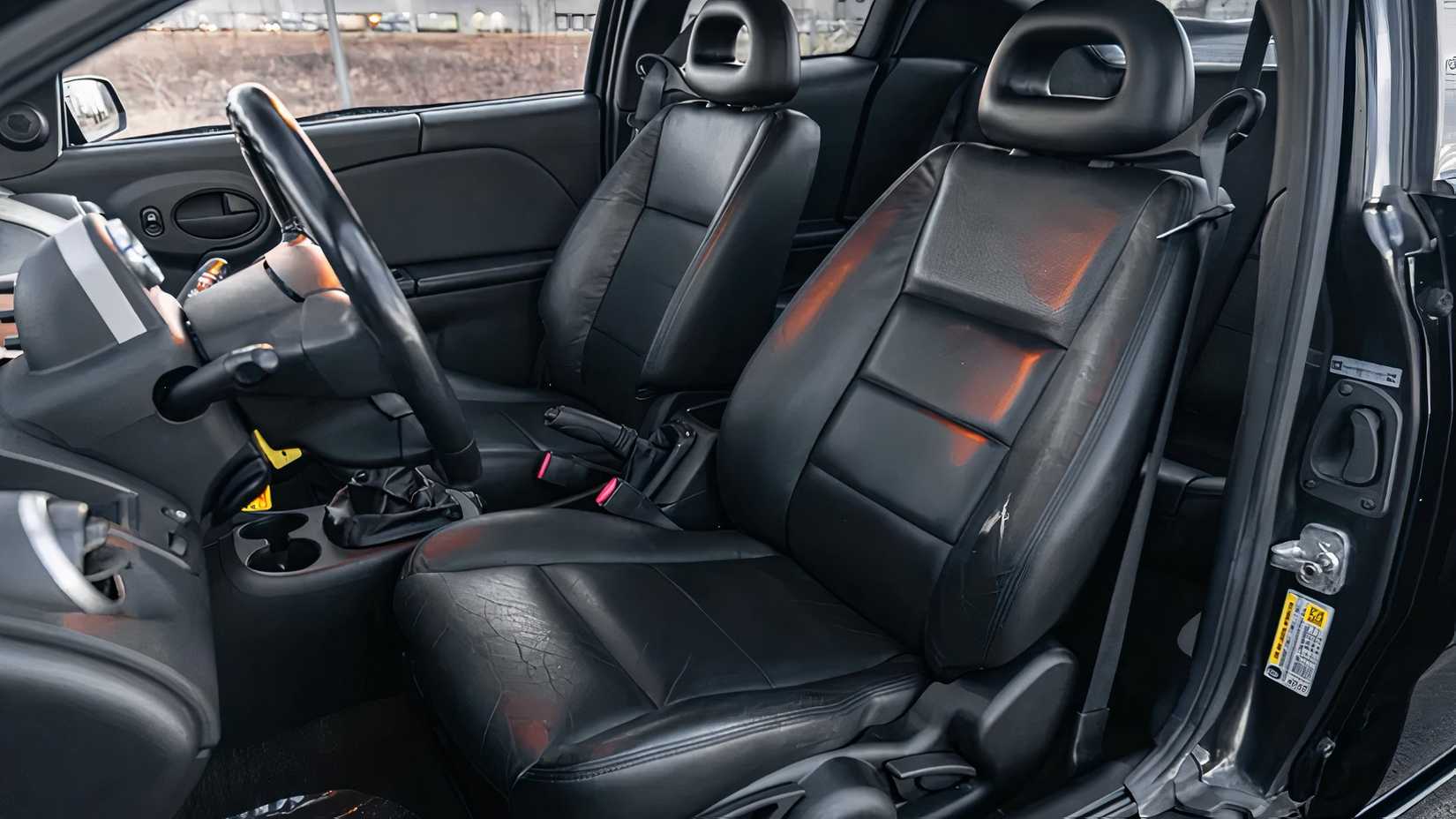 2007 Saturn Ion Quad Coupe Redline Edition interior showing front seats