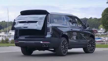 2025 Chevrolet Suburban in black parked in parking lot