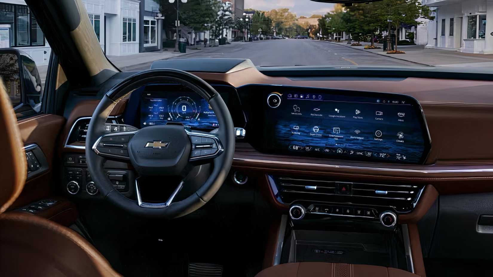 Interior do Chevrolet Suburban 2025 mostrando volante e painel