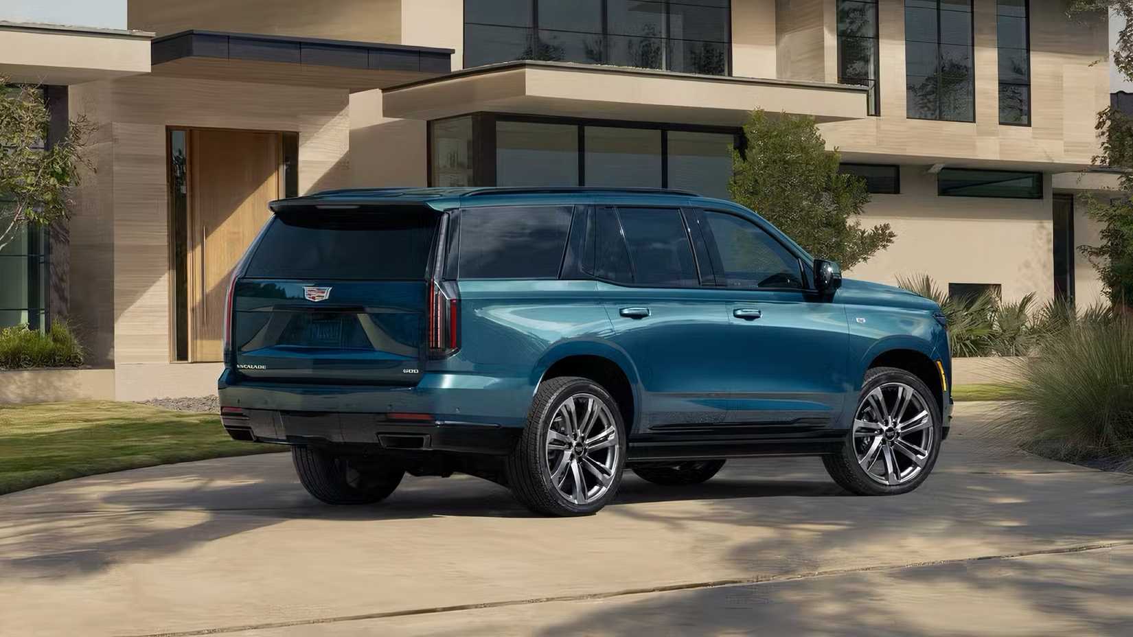 2025 Cadillac Escalade in blue parked on driveway