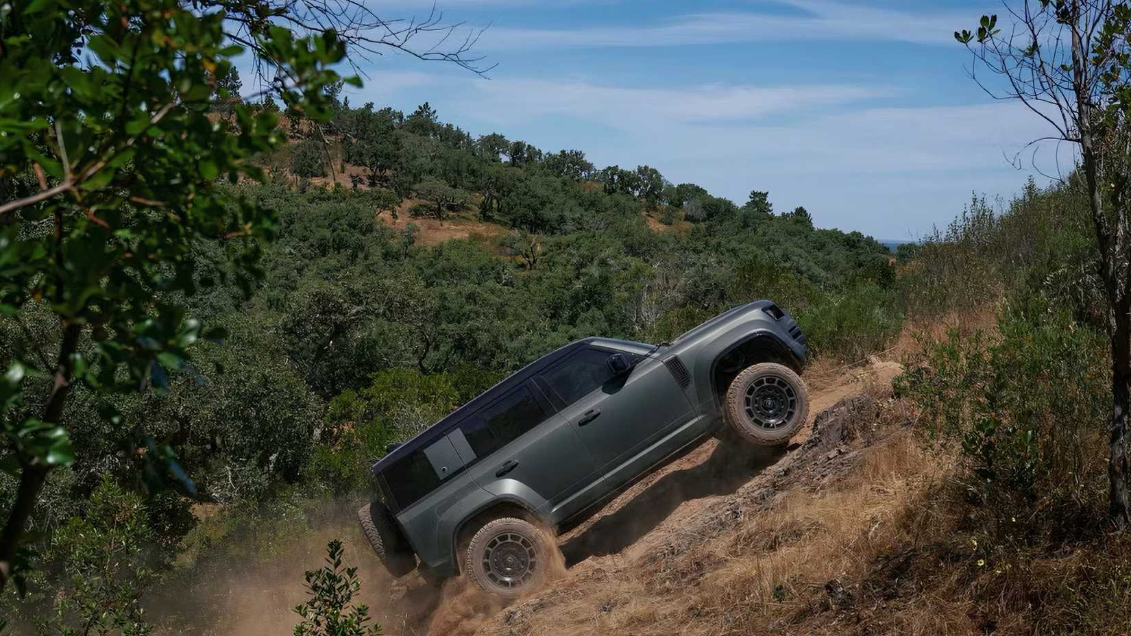 2025 Land Rover Defender OCTA driving up steep off-road gradient