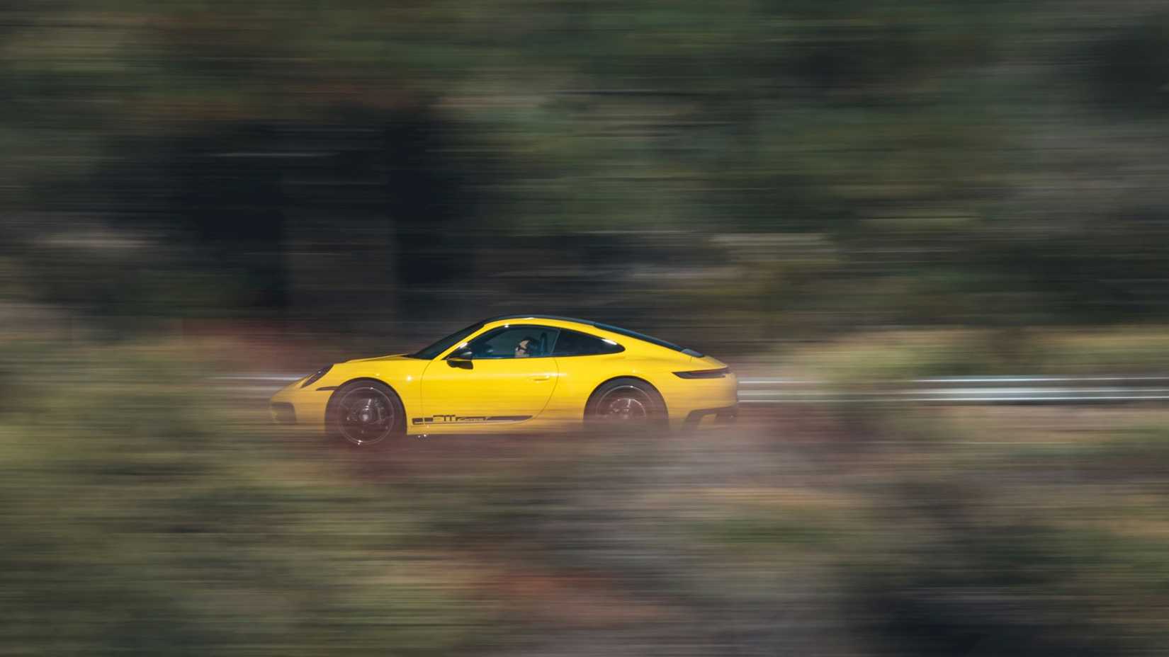 2025 Porsche 911 Carrera T Driving on the road