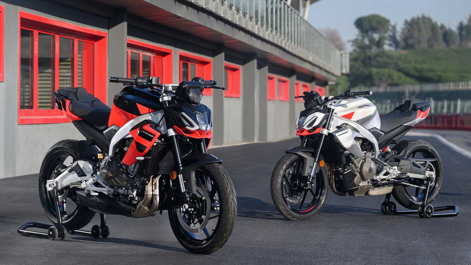 Two 2025 Aprilia Tuono 457s Parked In The Pitlane