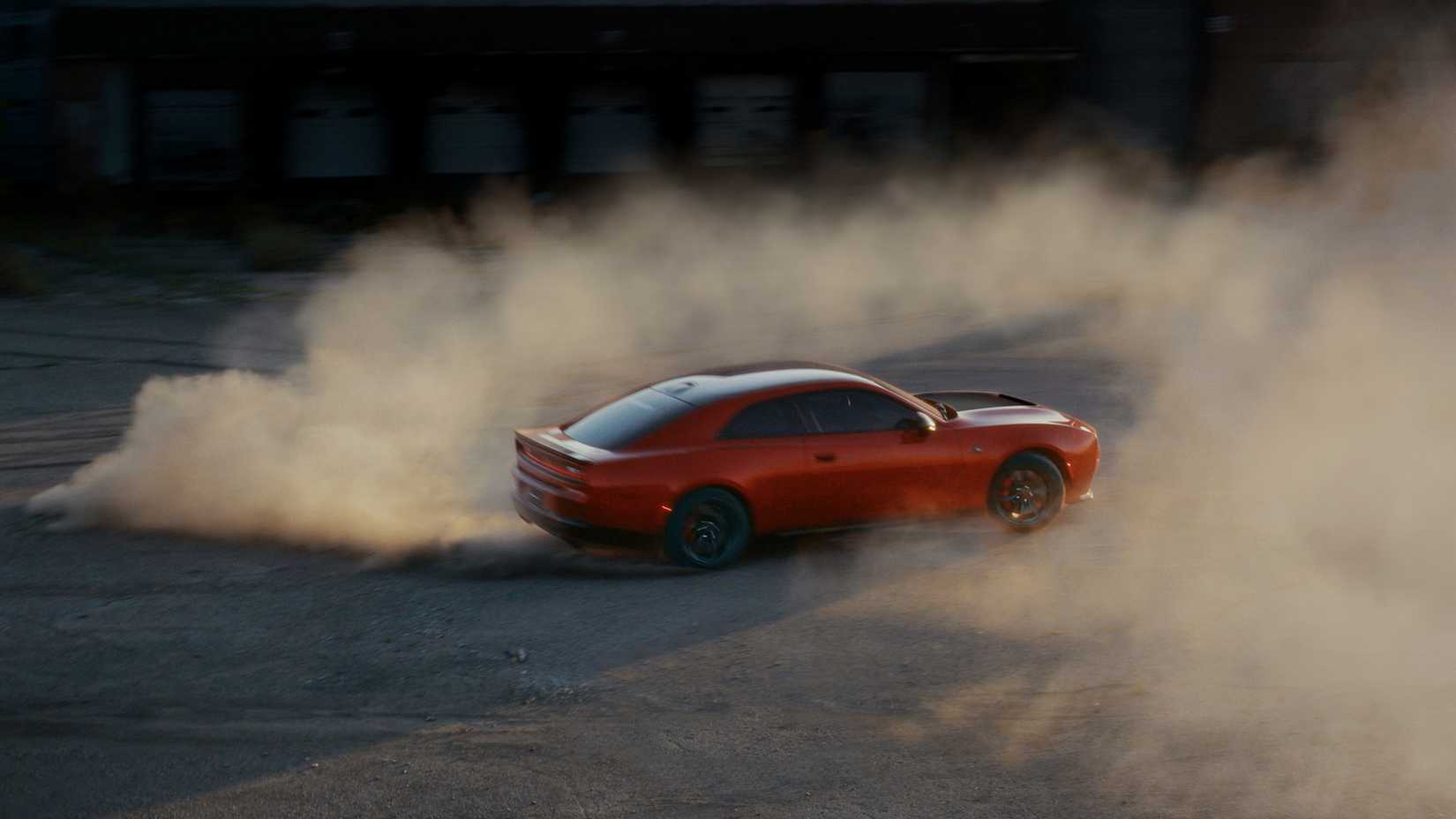 Laranja 2026 Dodge Charger Scat Pack ariel shot burnout