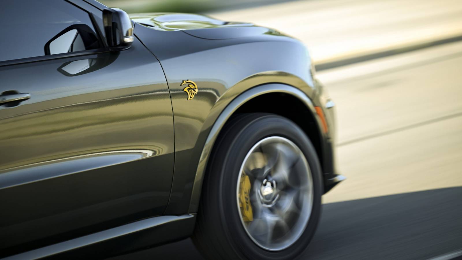 10 Pickups And SUVs That Can Smoke Sports Cars Off The Line